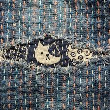 The Art of Visible Mending: Sashiko and Garment Longevity